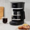 CAFETERA-PROGRAMABLE-OSTER-NEGRO-12-TAZAS-BVSTDCP121B_H001-198_4 CAFETERA PROGRAMABLE OSTER NEGRO 12 TAZAS BVSTDCP121B